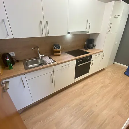 Boardinghouse-halverde Lejlighed